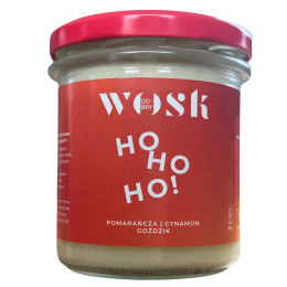 Świeca sojowa Dobry Wosk Ho Ho Ho! – czerwona etykieta i aromat pomarańczy, cynamonu oraz goździków.